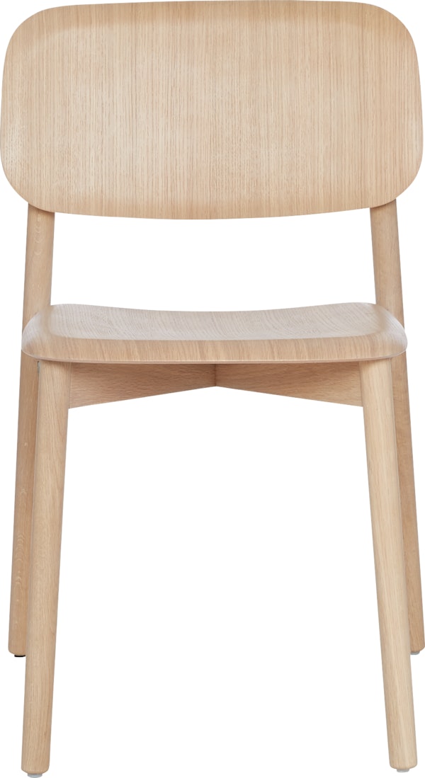 A matte lacquered oak Soft Edge 12 Side Chair viewed from the front
